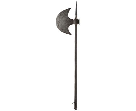 A 19TH CENTURY INDIAN TABAR AXE, 19cm crescent head profusely etched with scrolling foliage, the tapering haft with square se