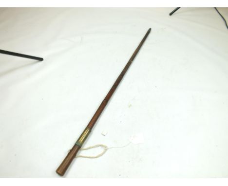 A LATE VICTORIAN WORN SWORD STICK, of characteristic form and displaying wear commensurate with its age.