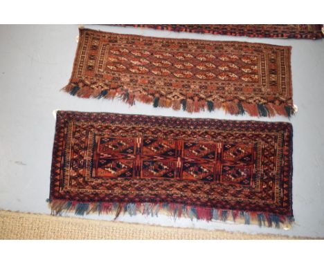 Three Tekke Turkmen torba faces, Turkmenistan, early 20th century, the first with kejebe design, remains of fringing to lower