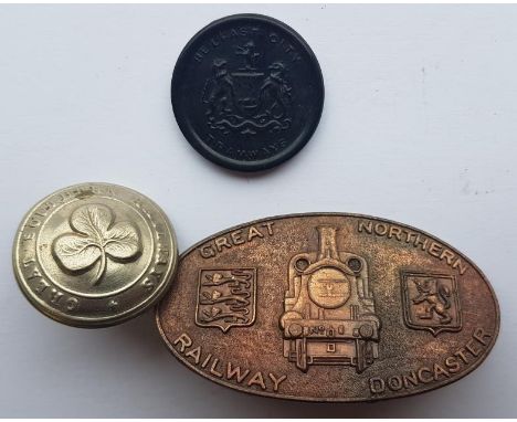 Great Southern Railways (Irish) Buttons (2), a Coras Iompair Eireann Button and a Great Northern Railway Doncaster Badge (4) 