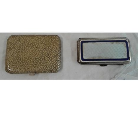 A Silver and Enamel Cigarette Case, Hallmarked Birmingham by Henry Manton along with a Shark Skin Cigarette Case marked "Arge