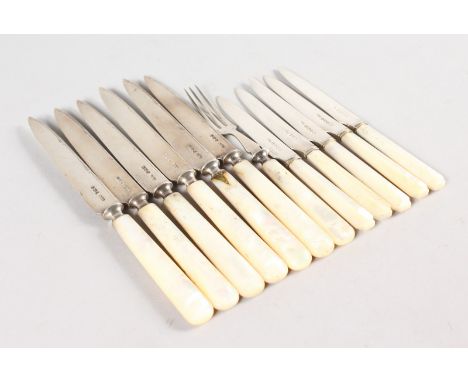 A SET OF SIX FRUIT KNIVES with mother-of-pearl handles, Sheffield 1900, five smaller knives and a fork (12).