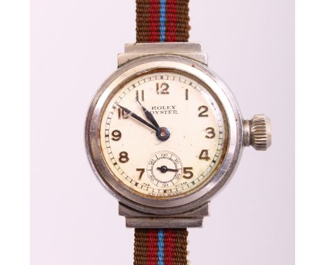 A LADIES ROLEX OYSTER WRISTWATCH with two-coloured strap, No. 65339.  In a Harrods box with original advertising leaflet.