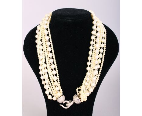 A VERY FINE CULTURED PEARL NECKLACE with white gold diamond clasp.