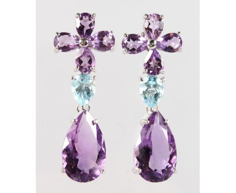 A PAIR OF SILVER, AMETHYST AND BLUE TOPAZ DROP EARRINGS.