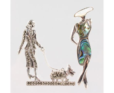 TWO SILVER ART DECO DESIGN BROOCHES of ladies.