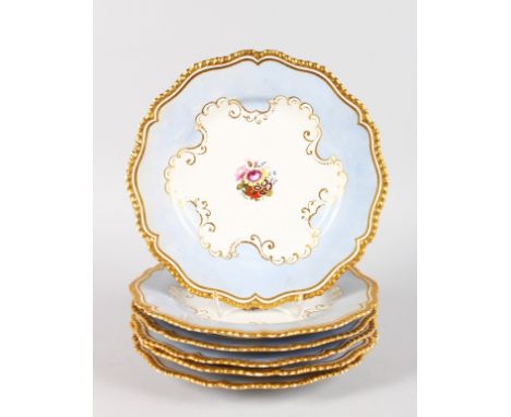 A GOOD SET OF SIX FLIGHT BARR AND BARR WORCESTER PLATES, gadrooned edge in gilt, light blue border, the centre painted with f
