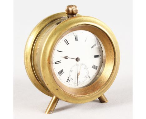 A TRENCH ART BRASS CLOCK, set with a silver pocket watch.