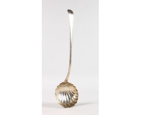 A GEORGE II BRIGHT CUT SOUP LADLE with shell bowl. London Circa. 1739.  Maker: W.F.