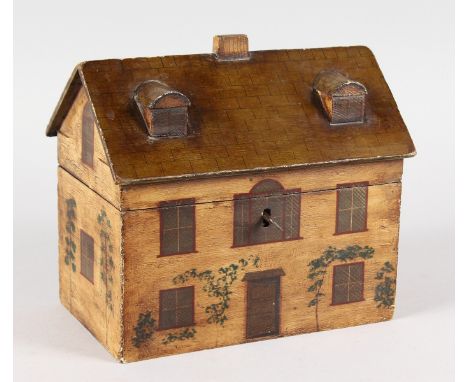 A GOOD GEORGIAN TWO-DIVISION PAINTED WOOD HOUSE TEA CADDY, the lift up roof with chimney and two windows, door and five windo