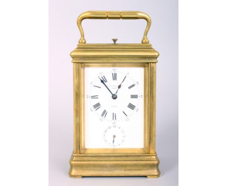 A GOOD FRENCH BRASS CARRIAGE CLOCK, retailed by CHARLES FRODSHAM & CO., 19677, PARIS, with repeat action and alarm.  5ins hig
