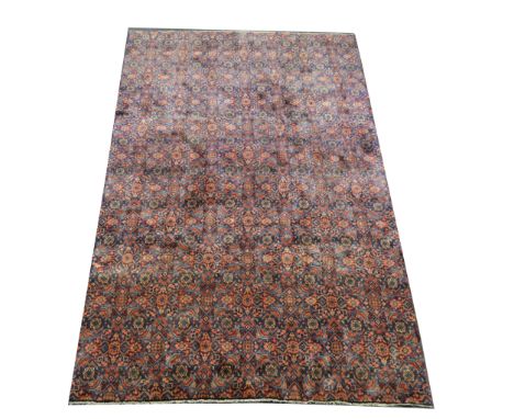 Hamadan carpet, all over repeat design of open guls against a navy ground, 295 x 193cm.