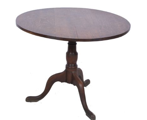 Late Georgian oak tripod table, circular tilt-top, turned column, splayed legs, diameter 89cm.