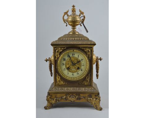 19th Century French brass cased bracket/table clock by Japy Freres, urn finial, foliated skirt and scrolled feet, height 41cm