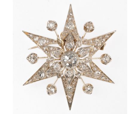 A Victorian diamond set star brooch, sixty-one old brilliant cut and rose cut diamonds, set in a six ray star mount,40mm diam