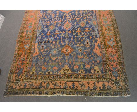 Ushak pattern red ground carpet, 333cm x 256cm