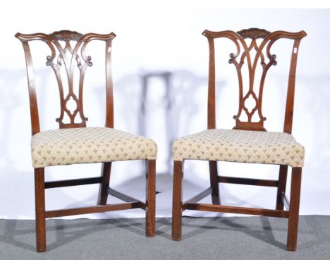 Set of three Chippendale mahogany dining chairs, carved crestings, pierced vase splats, tapestry style upholstery, square mou