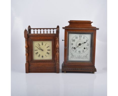 Continental walnut shelf clock, with a John Ball alarm, height 36cm; and another oak shelf clock. (2)