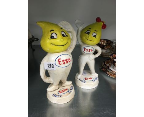 A pair of painted cast iron Esso advertising figures.