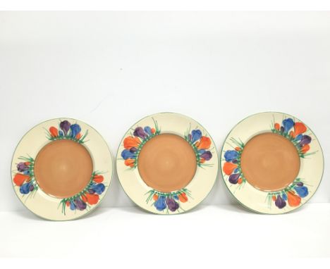 Three various Clarice Cliff Crocus pattern side plates.