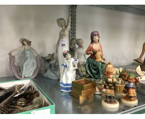 A small quantity of various figures including Hummel and three miniature framed coins.