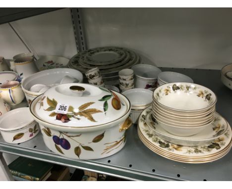 The residue of a Royal Doulton Larchmont dinner service together with Royal Worcester Evesham Oven-To-Tableware items.