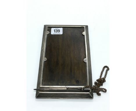 An Art Deco engine turned silver desk note pad holder and propelling pencil. (19)