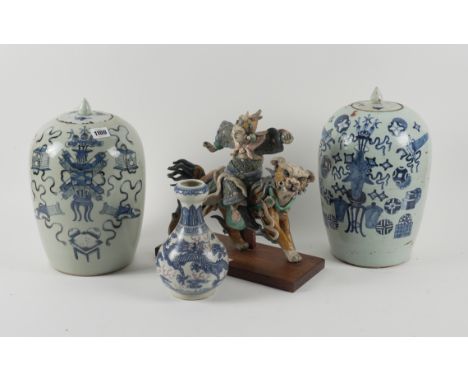 A GROUP OF CHINESE CERAMICS (6)Various dates Comprising; two blue and white slender ovoid jars and covers, painted with vases