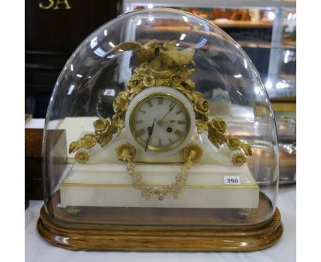 Early 20th century French alabaster mantel clock, with Roman enamel dial, the cylinder movement striking on a bell.