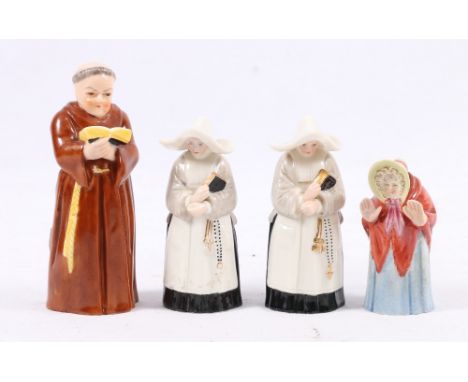 Four Royal Worcester candle snuffers, monk, two nuns and another, 12cm - 8cm.