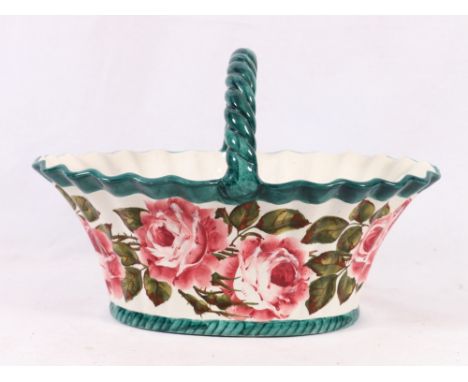 R H & S Wemyss ware basket with cabbage rose pattern, 31cm.   CONDITION REPORT:  Crazed througout.  Chip to inside at base of