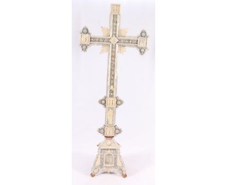 19th century Italian mother-of-pearl altar crucifix, on a triform base, on olive wood, some losses, some parts present, 83.5c