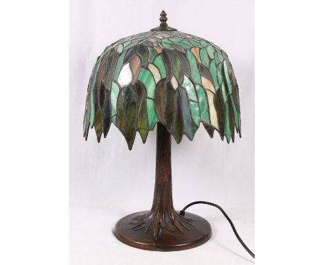 Tiffany style table lamp with leaded stained glass shade, 54cm.