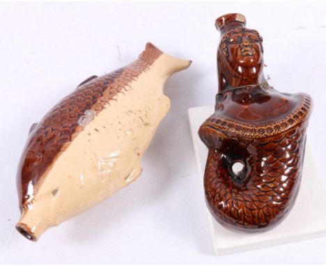 Scottish Pottery flask modelled as a mermaid and another a fish, 19cm and 23cm. (2)