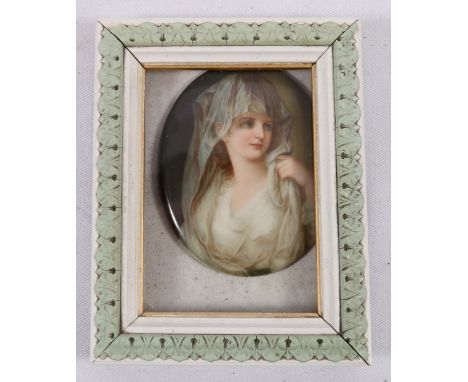 French portrait miniature of a lady wearing a veil, watercolour on porcelain, 8cm.