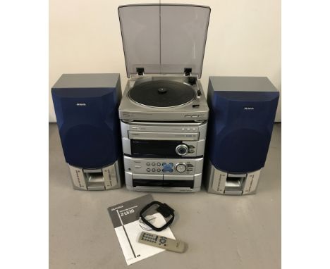 Aiwa compact disc stereo cassette receiver together with a pair of speakers &amp; turntable. 3 disc rotary changer digital au