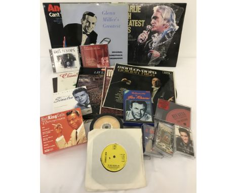 A small quantity of mixed music comprising; LP's, 7", CD's and cassette tapes. To include: Frank Sinatra and Nat King Cole CD