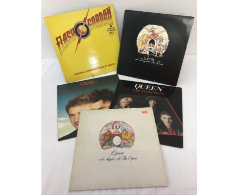 5 vintage Queen vinyl LP's. Comprising: A Night At The Opera with gatefold sleeve ( EMTC 103), The Miracle (PCSD 107), A Day 