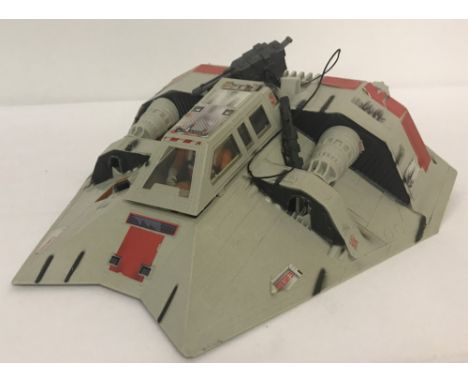 A 1996 Hasbro, Star Wars, battery operated Snow Speeder with 1995 Kenner Toys figure. Snow Speeder has light and sounds elect