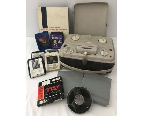 A vintage Grundig TK400 Automatic reel to reel audio player and tapes.Together with an accessories kit &amp; extra tapes and 