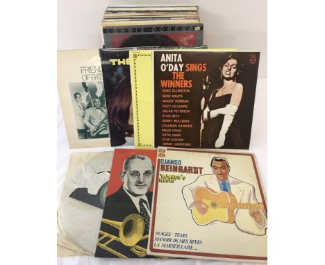 A box of 50 assorted vintage Jazz LP's. To include: Glenn Miller Army Air Force Band, Nat King Cole Trio, Perry Como and 1 si