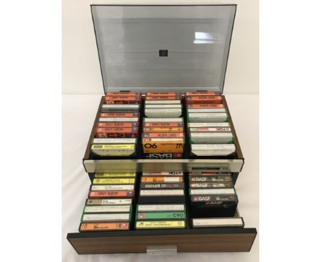 A vintage Cambria Cases "Stako Tape" 2 tier cassette tape storage box, Cassette 69. Together with a quantity of cassette tape