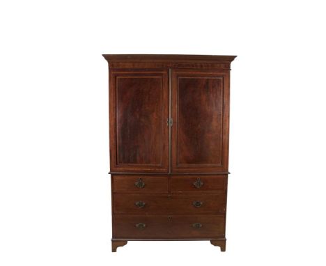 A LATE GEORGIAN INLAID MAHOGANY LINEN PRESS, with moulded cornice above twin fielded panel doors with satinwood banding and r