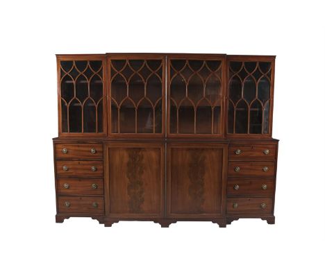 A 19TH CENTURY INLAID MAHOGANY RECTANGULAR BREAKFRONT BOOKCASE, fitted low cornice above four astragal glazed panel doors, on
