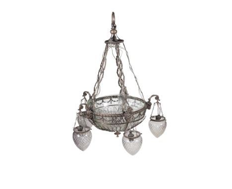 AN EMPIRE STYLE SILVER PLATED FRAMED CIRCULAR CEILING LIGHT, the frame with rams' heads supporting five drop lights with cut 