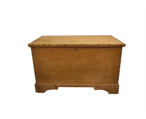 A STRIPPED PINE RECTANGULAR BLANKET CHEST, of rectangular form, with hinged lift top and raised on bracket feet. 61 x 110 x 6