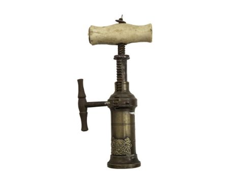 A GEORGIAN BRASS CYLINDER CORKSCREW, with applied manufacturer's crest and ivory handlePLEASE NOTE: THIS ITEM CONTAINS OR IS 