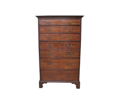 A GEORGE III MAHOGANY SECRETAIRE TALLBOY CHEST, with moulded cornice above six long graduated cock beaded drawers with brass 