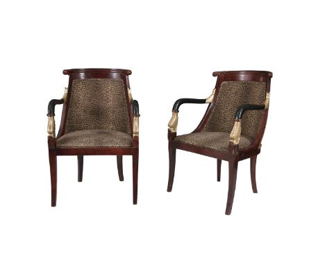 A PAIR OF REGENCY STYLE STAINED AND GILDED FRAME ARMCHAIRS, in the Neo-Grecian taste, the curved panel backs and seats covere
