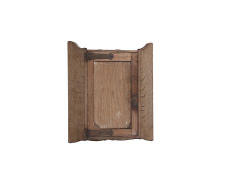 A 19TH CENTURY LIMED OAK DWARF CORNER CUPBOARD, fitted single fielded panel door with iron external hinges and raised on brac